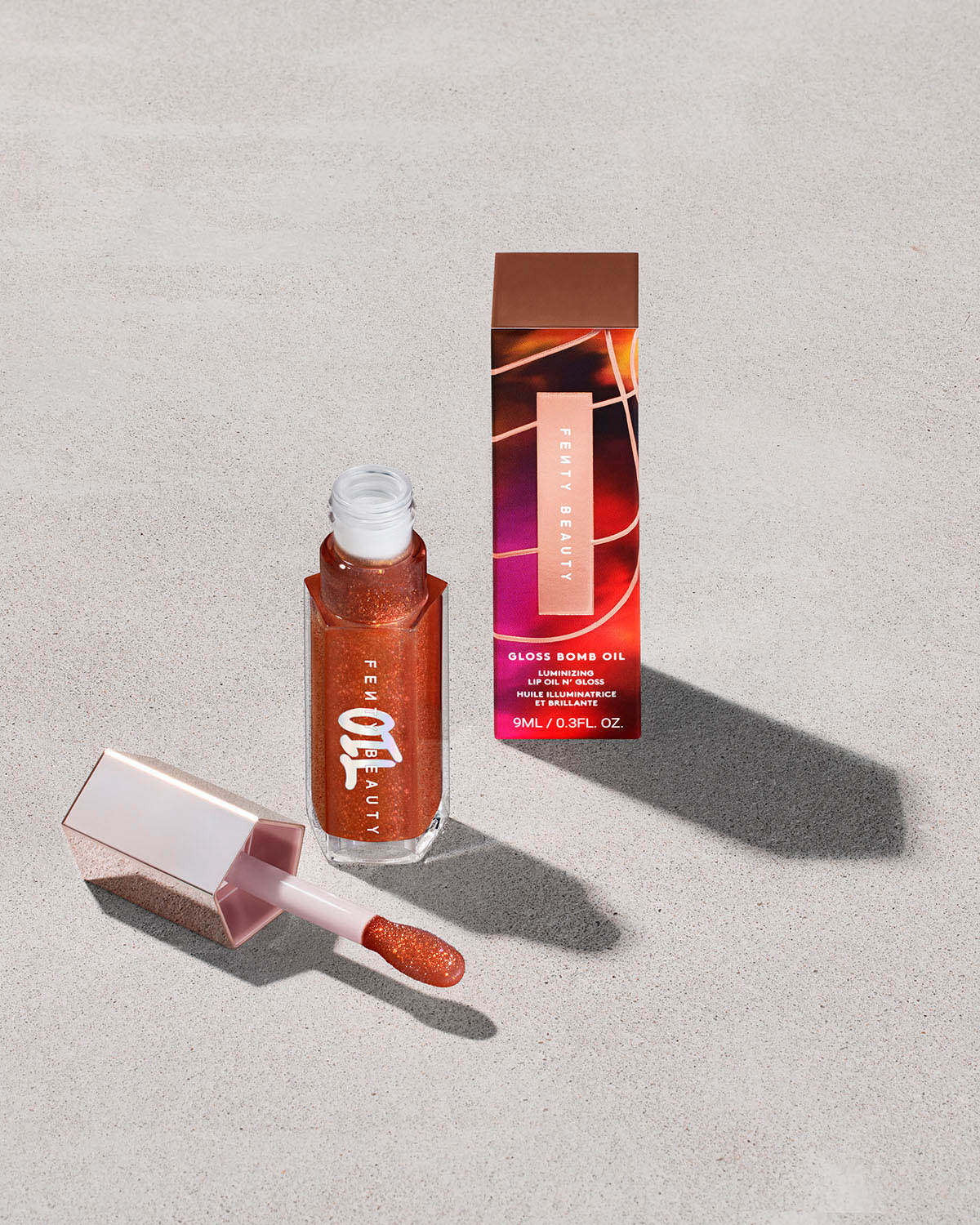 Gloss Bomb Oil Luminizing Lip Oil N' Gloss — Fro$ted Bunz